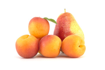 Apricots and multi-colored pear isolated on white