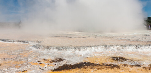 Naklejka na ściany i meble Eruption of the Great Fountain Geyser in Yellowstone National park.