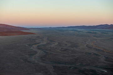 Exterior shot of the Namibian Sossusvlei sanddunes near the famous Dune 45 around sunrise