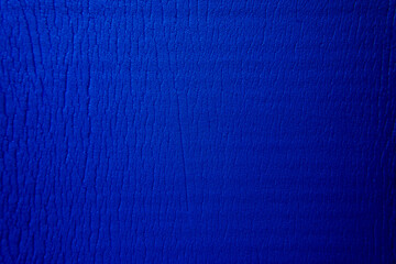 Closeup old used PVC dark blue color non slip yoga foam mat for women men kids texture background...