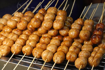 Many thai pork sausage on grill at markets in Thailand