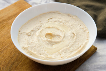 Home made hummus with vegetables, vegan healthy food for breakfast, lunch or dinner