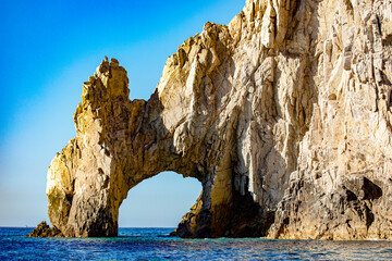 Fototapeta na wymiar Photo of the incredible arch of Cape Saint Luke, which is where the Sea of Cortez meets the Pacific Ocean, in the state of Baja California Sur, Mexico. Arch concept.