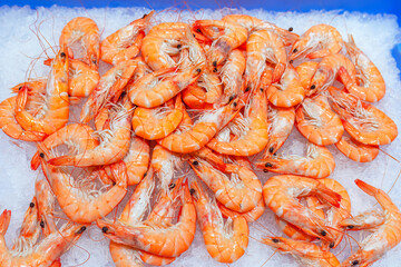 Fresh shrimp on ice for sale at the fish market in Thailand