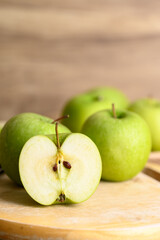 Green apple fruit on cutting wooden board, Healthy fruit