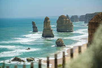 Twelve apostles rock formations at the great ocean road in sunny weather with a blue sky, Victoria,...