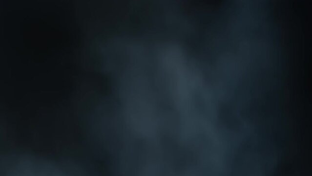 The cinematic atmosphere of smoke being hit with white strobing light. Layered VFX atmospheric violent strobe light clip. The 4K slow-motion atmosphere clip with moving flickering light.