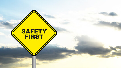 Yellow safety first sign. 