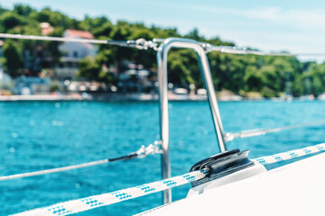 View from the sailing yacht on the port city. The yacht leaves the port.