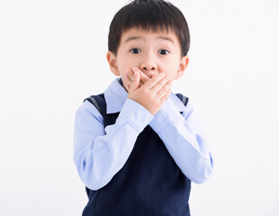 Little boy kid  shocked and hand covering mouth  for mistake