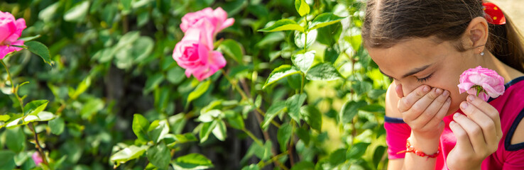 Spring flowers allergy in a child. Selective focus.