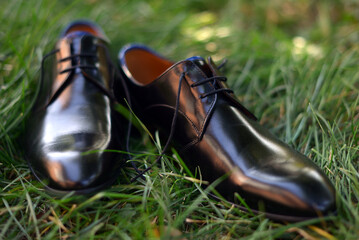 boots on grass