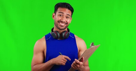 Happy asian man, clipboard and pointing to you on green screen for fitness signup against a studio background. Portrait of male person or gym instructor calling for register, document or paperwork
