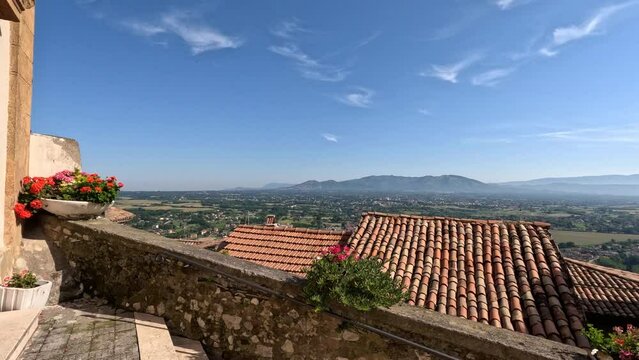 The landscape seen between the old houses of Artena. a medieval town near Rome, Italy.