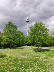 Obraz premium view of the Danube Tower in Vienna with cloudy sky in the background