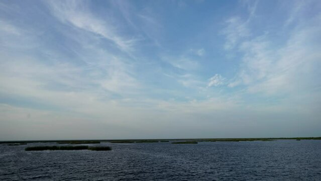 Light cirrus cloud passing over Lake Okeechobee