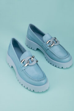 Stylish blue loafers for a woman