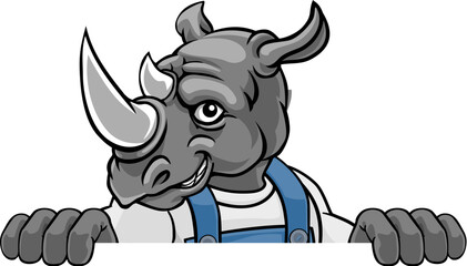 A rhino cartoon animal mascot gardener, carpenter, handyman, decorator or builder construction worker peeking around a sign