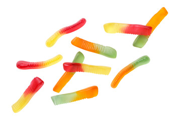 Colored jelly worms flying close-up on a white. Isolated