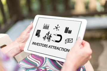 Investors attraction concept on a tablet