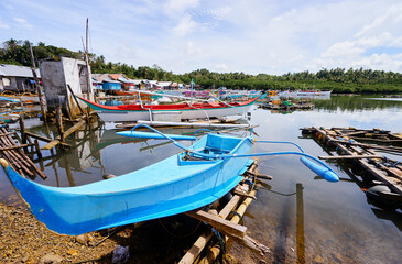 Traditional fishing boats harbour at Siargao, Philippines.