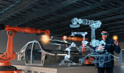 Asian Man Engineer hold smartphone touch touching UI screen interface for manufacturing industry technology Product export and import future Robot cyber warehouse arm robot future technology.