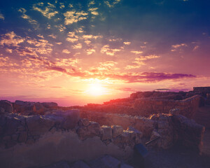 Beautiful sunrise over Masada fortress. Ruins of King Herod's palace in the Judean Desert
