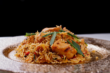 Oriental pilaf with chicken, green onions and spices