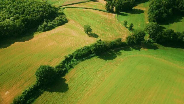 Aerial drone footage of countryside land in sunny summer day. Countryside landscape Germany