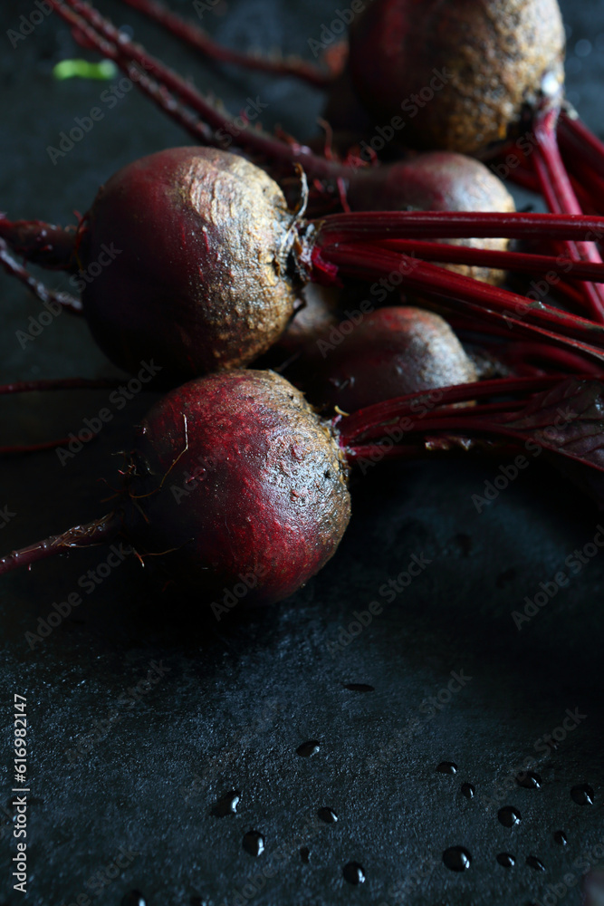 Poster bunch of beets on a baking sheet