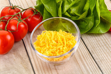 Shredded cheese in the bowl