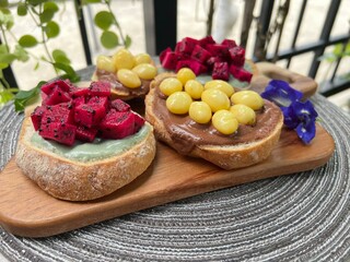 Chocolate ginkgo with pink dragon fruit green yogurt toast
