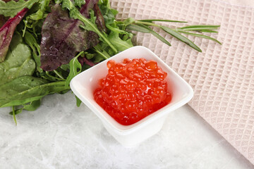 Red caviar in the bowl