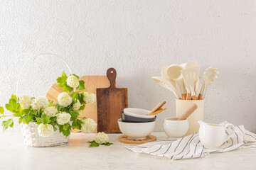 Modern kitchen countertop background in an eco-friendly kitchen with a variety of wood and ceramic items. Eco style. Zero waste.