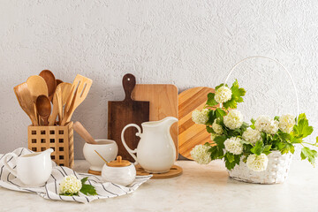 Beautiful kitchen countertop interior with various kitchen utensils and decor in light colors. ecologically clean kitchen. Eco items