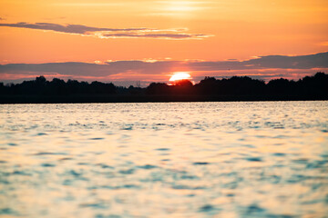 abstract background of waves at sunset