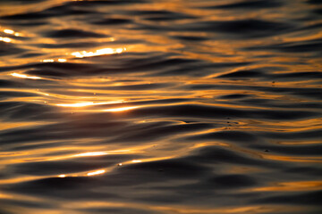 abstract background of waves at sunset