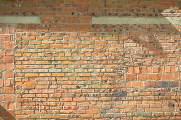 Brick wall. Red brick. Wall details.