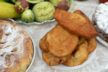 Baked pies. Pastries on table. Delicious food.