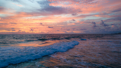 Fototapeta premium Golden at beach sunset clouds ,nature color real burn weather, beautiful weather time. Beautiful exotic day time, clean horizon, panorama