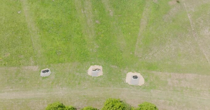 Bases At An Outdoor Shooting Range In Leach, Oklahoma. aerial tilt-up