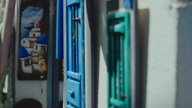 Santorini painting at a local shop in Santorini Island, Greece. Showing Blue dome from a church 
