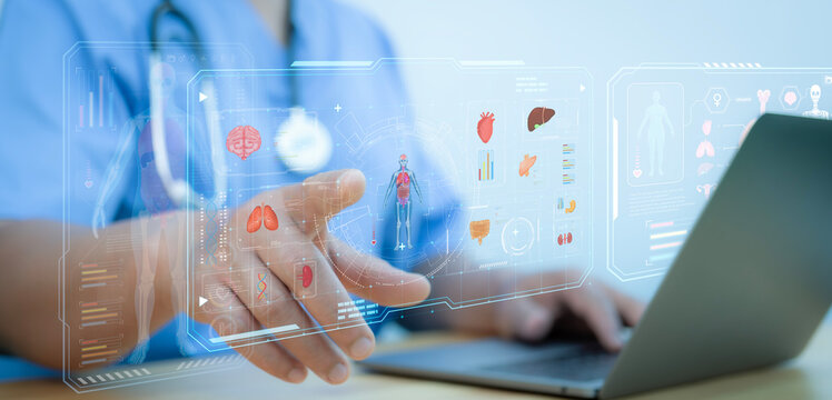 Doctor touch hologram of human system. Medical future technology and innovative concept. The concept support the health of the internal organs of the body.Modern medicine,healthcare,medical insurance