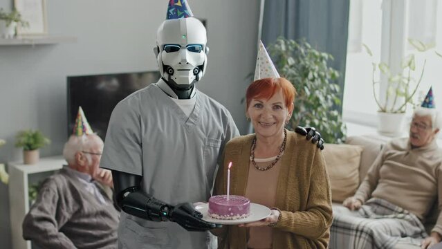 AI generated shot of cheerful senior woman celebrating birthday standing with humanoid robot nurse holding plate with cake looking at camera