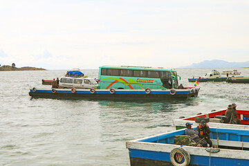 Fototapeta na wymiar Vans and Buses on the Ferries Crossing the Strait of Tiquina on Lake Titicaca, Bolivia, South America