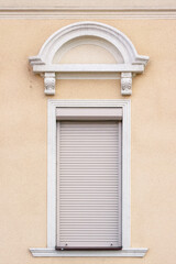 Fototapeta premium modern windows on the grunge facade. ancient architecture