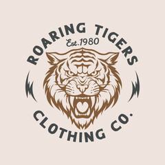 tiger vintage clothing emblem, roaring tiger, aggressive