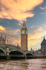 Fototapeta na wymiar Big Ben tower and westminster bridge at sunset