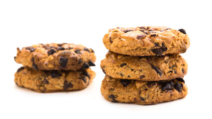 cookies with chocolate and hazelnuts on a white background