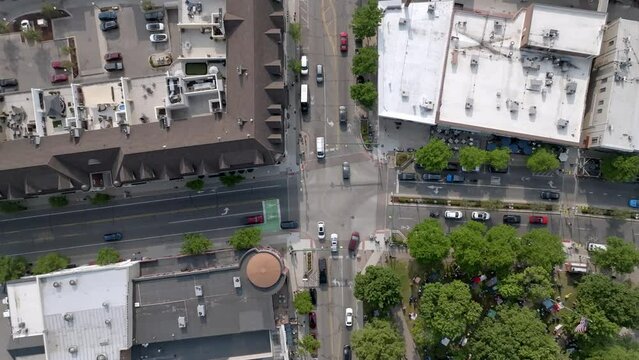 Intersection in downtown Plymouth, Michigan with drone video overhead stable.